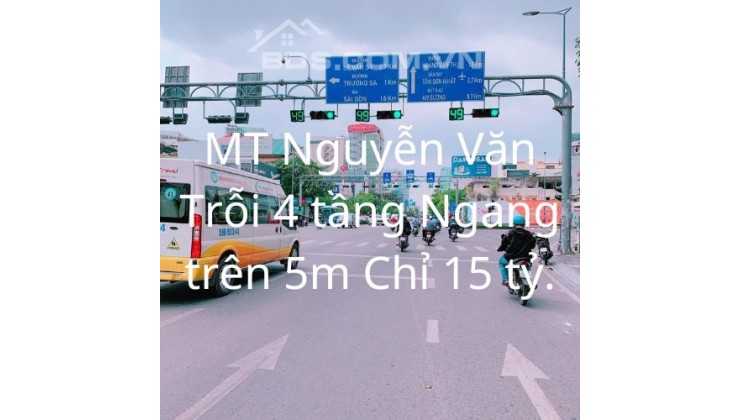 Bán Nhà Mặt tiền Kinh Doanh  Nguyễn Văn Trỗi 4 Tầng Ngang Trên 5m Chỉ 15 tỷ.